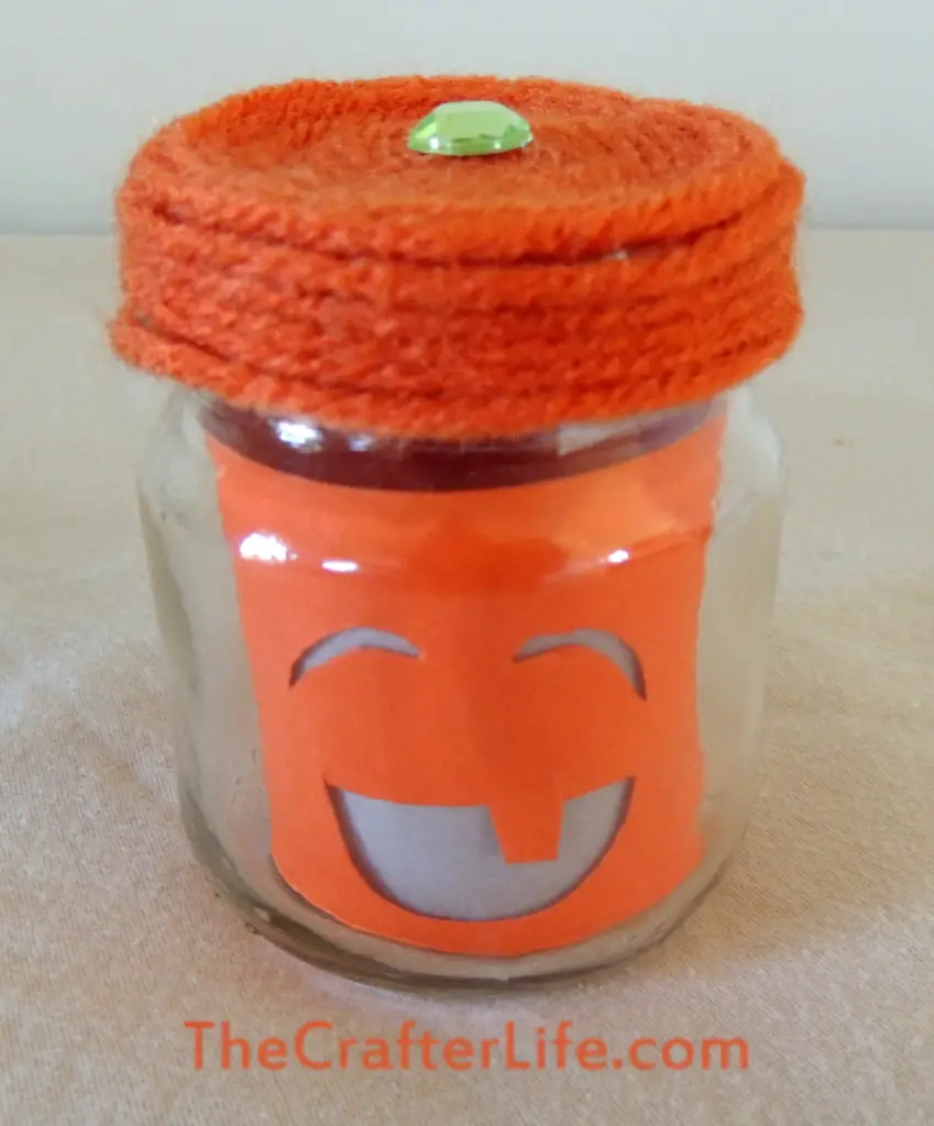 Pumpkin, baby food jar, candle